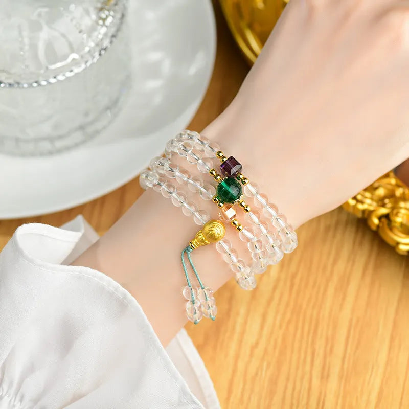 White crystal ethnic geometric rosary bracelet with 108 beads.