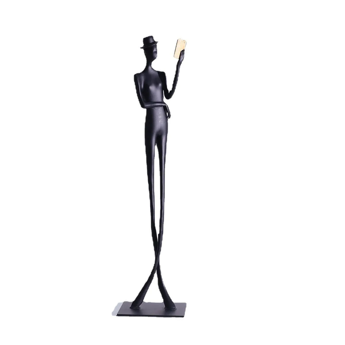 Black cast aluminium reading woman desktop sculpture measuring 51 cm tall