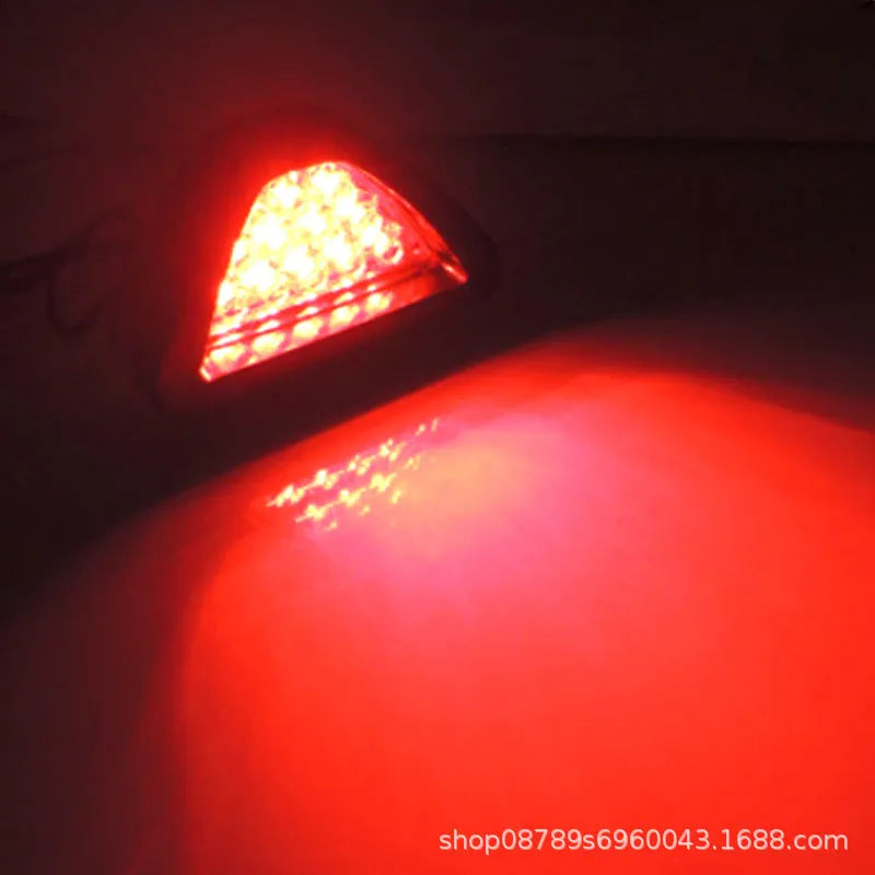 Triangular LED vehicle warning light with universal fit for cars and motorcycles in multiple colours