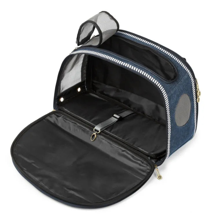 Blue denim pet diaper bag with cartoon patterns measuring 43cm by 20cm by 30cm