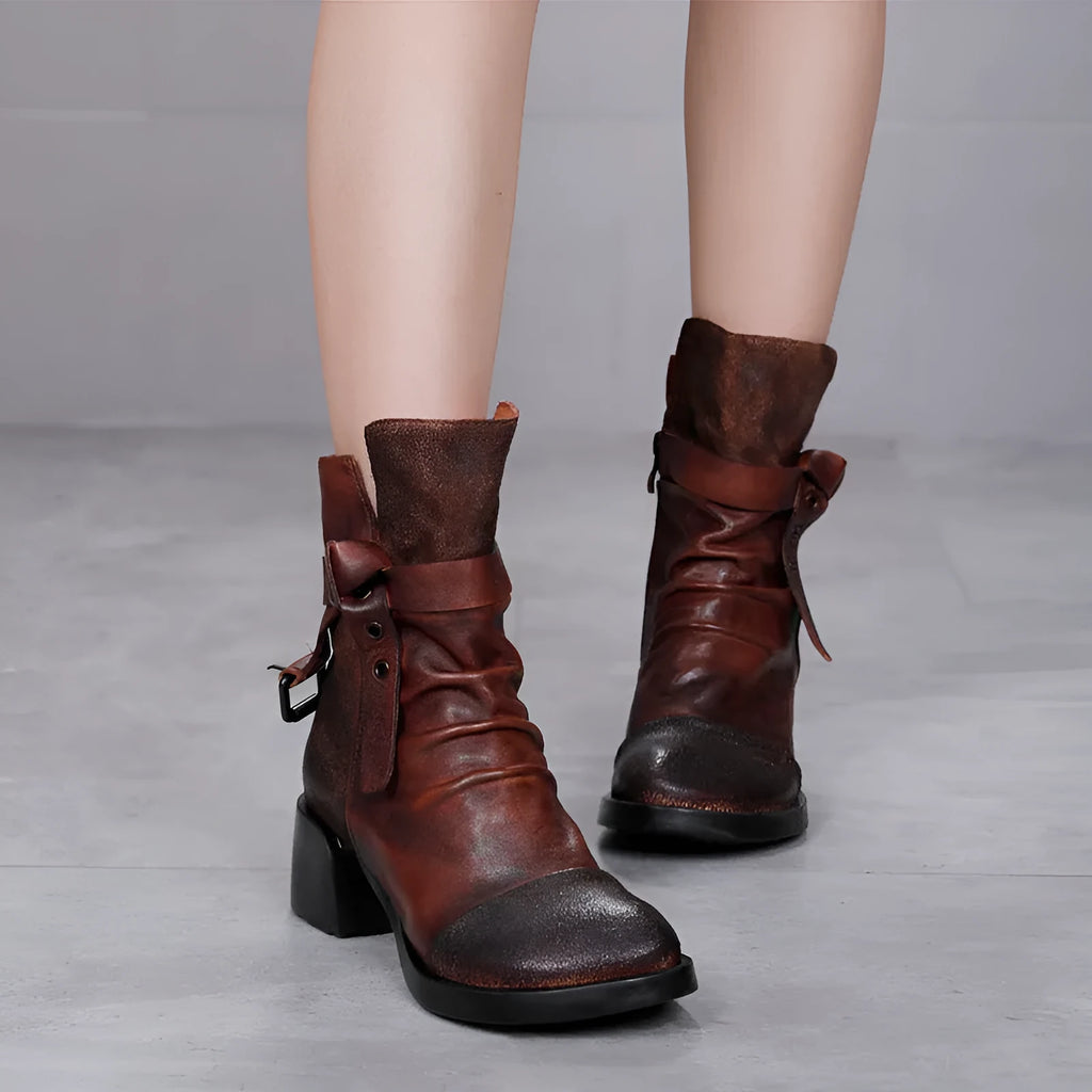 Women's black retro ankle boots with a chunky heel and genuine leather upper.