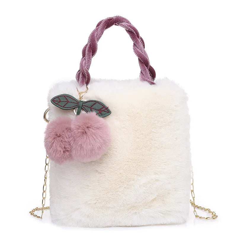 Large soft plush travel bucket bag in beige with open pocket and single shoulder strap