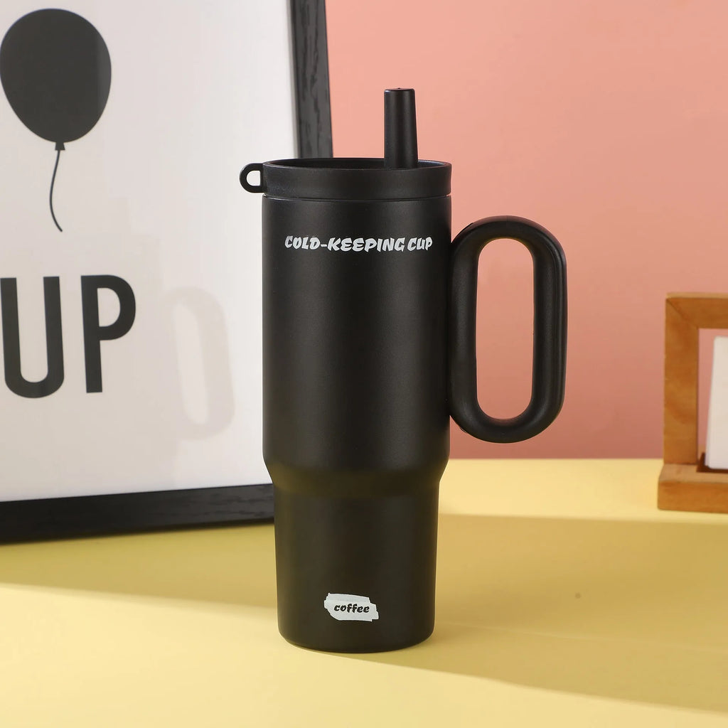 Large insulated portable straw cup with carry handle and straw in multiple colour options.