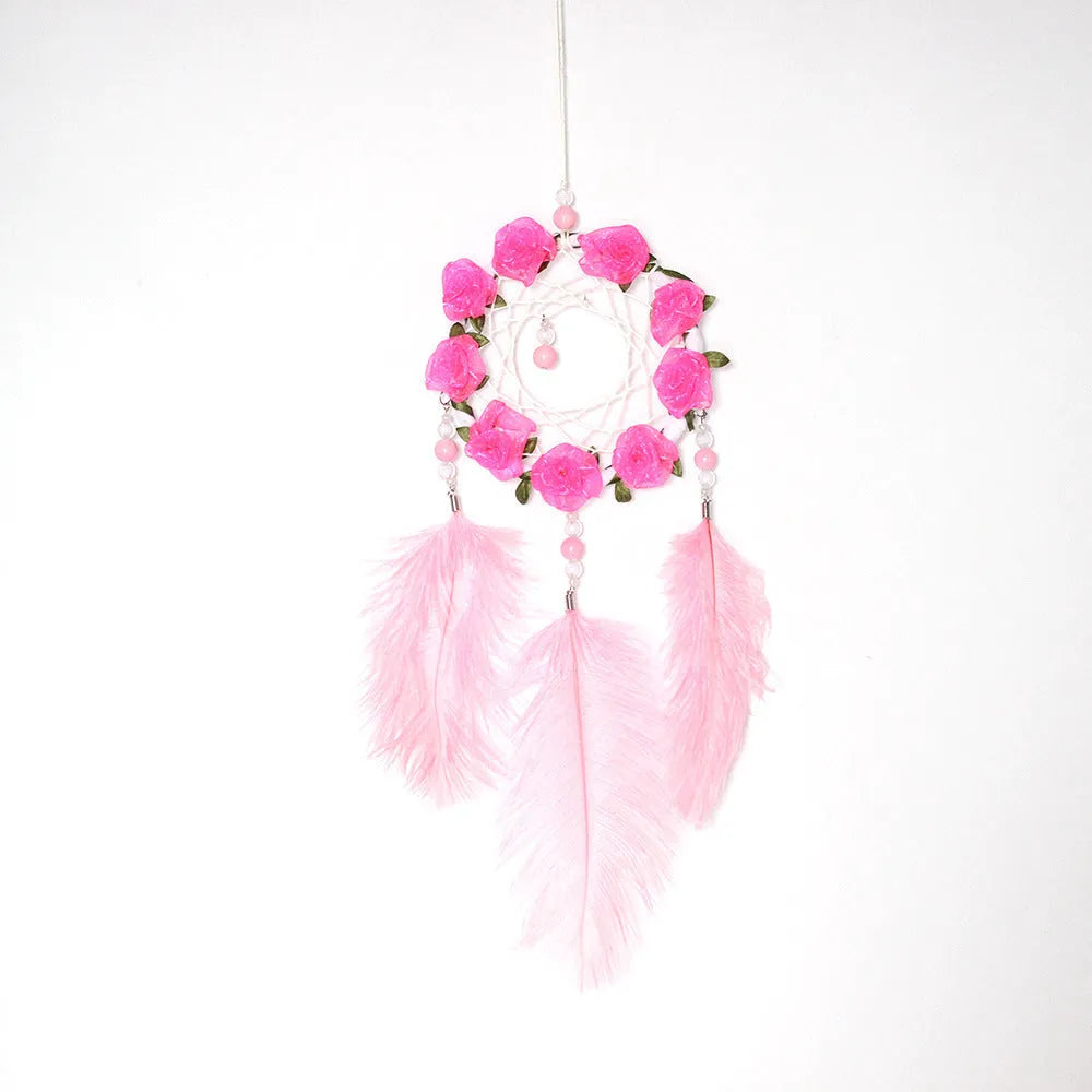 Pink ostrich feather dreamcatcher wind chime measuring 10cm for wall decoration
