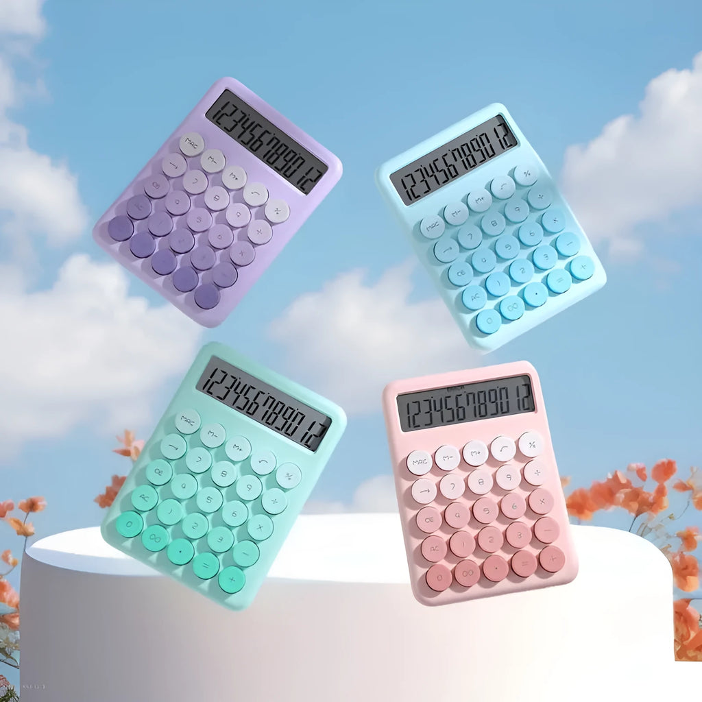 Dopamine gradient colour desk calculator in violet, pink, blue, and green on a white desk.