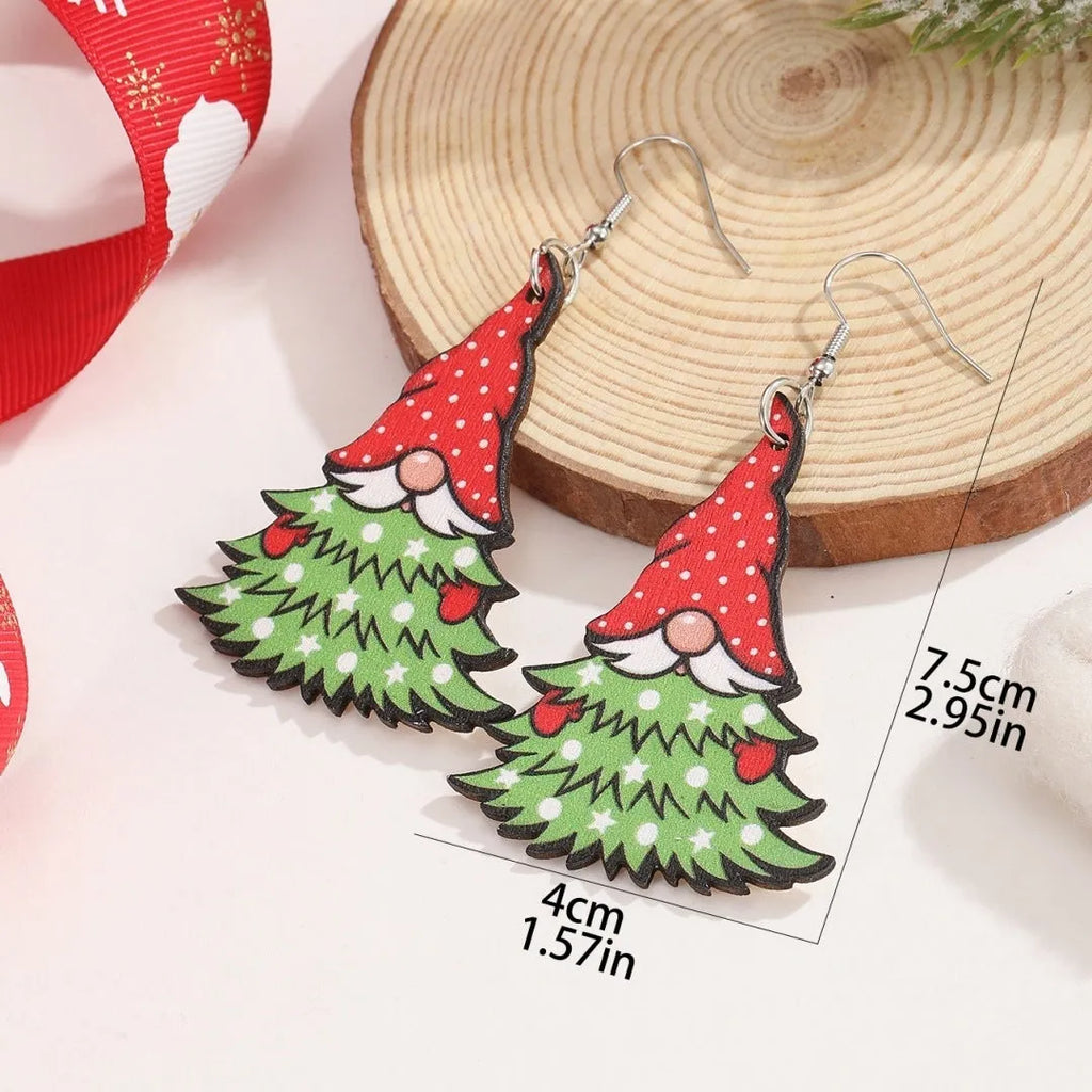 Wooden Christmas earrings showing Christmas tree and water drop snowman designs with geometric shapes