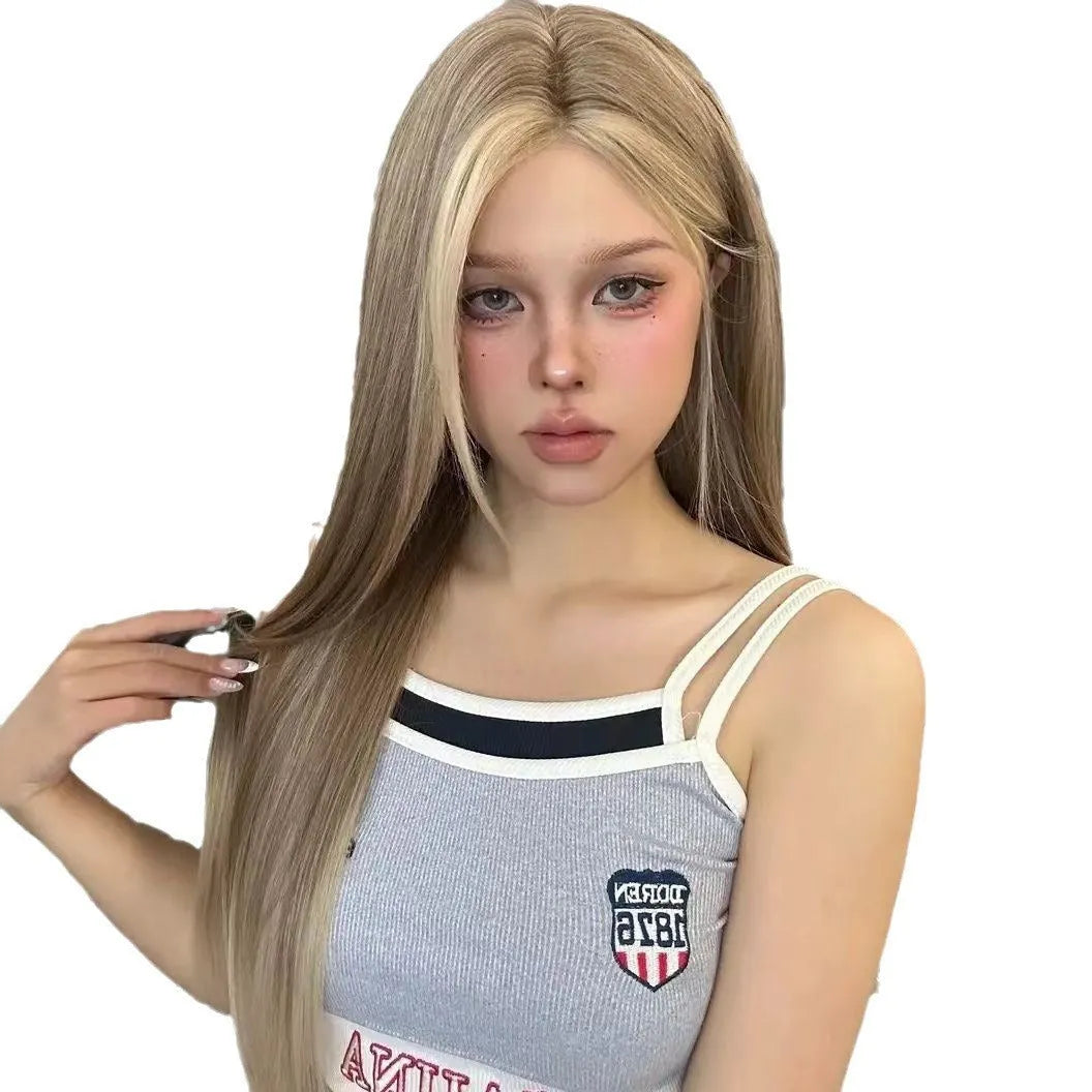 A woman's golden brown gradient forehead lace wig with a centre-parted style.