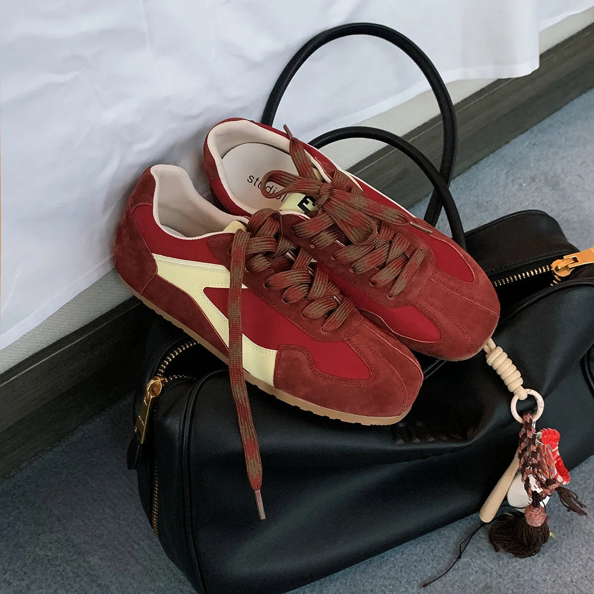Women's retro suede sneakers in solid red, sand, brown, or milk grey with rubber outsole and height-increasing sole, sizes 35-40