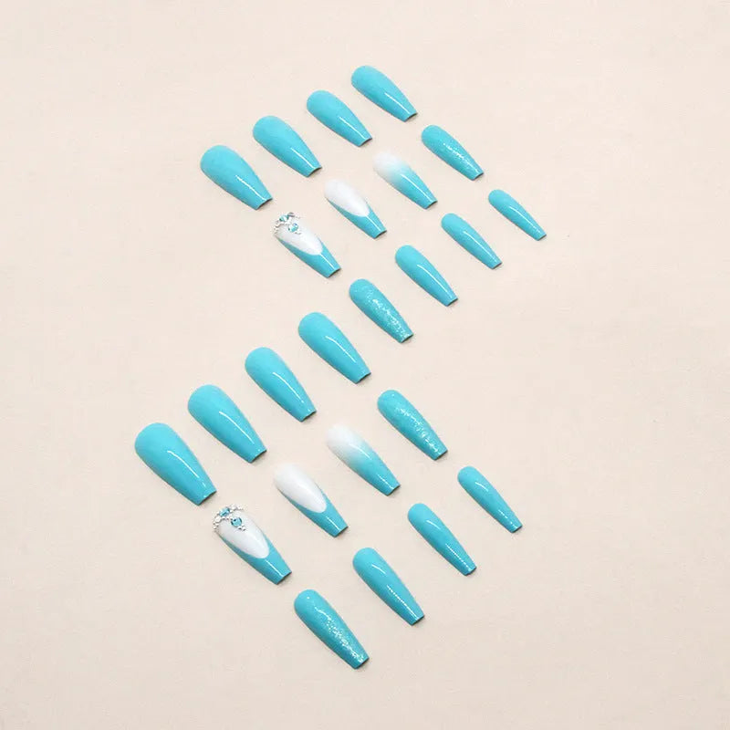 Long ballet-shaped false nails with blue diamond glitter, includes glue.