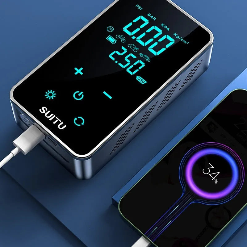 Black wireless car tyre inflator with LCD screen display and attached air hose on a grey background