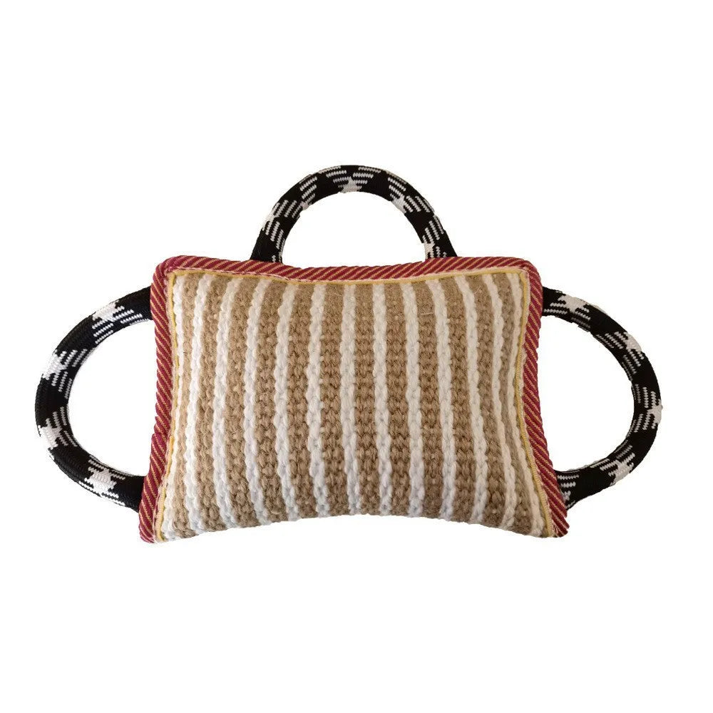 Colourful dog tug toy with a jute bite pillow centre and three rope handles.