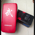 Red martial arts boxing kick target pad with hand-sewn seams for training
