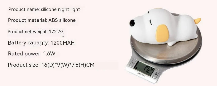 A two-tone cartoon dog-shaped silicone night lamp with a USB charging port.