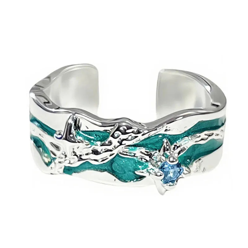 Mint green enamel asterism ring with folded copper construction and dripping oil treatment