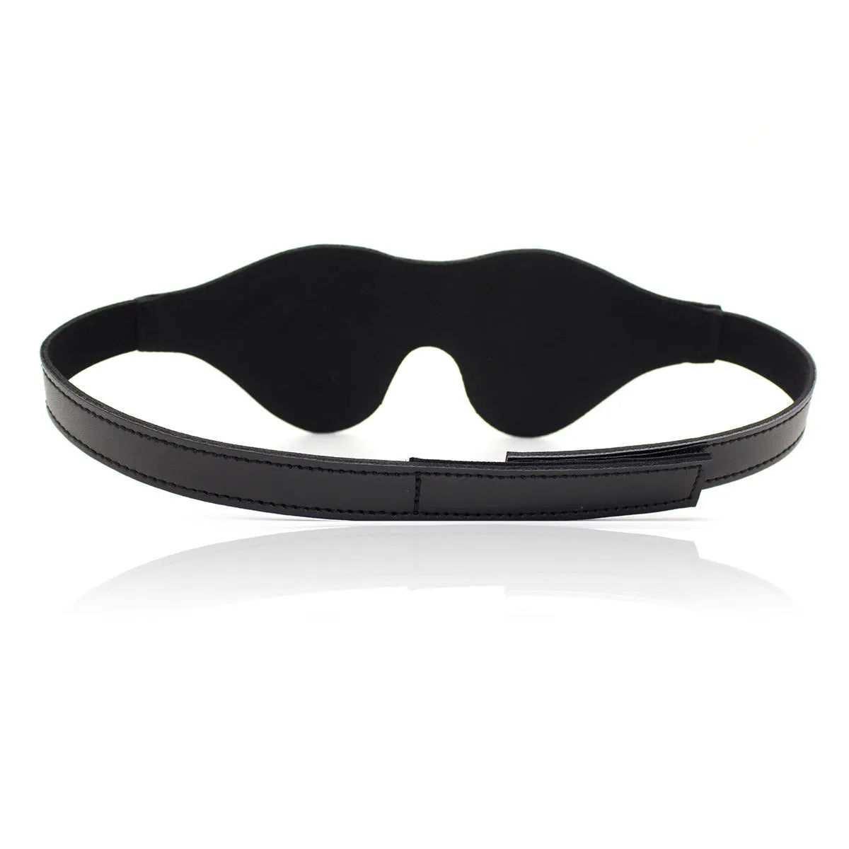 Women's black leather velcro eye mask blindfold showing three-dimensional shape and metal hardware.