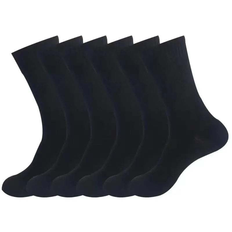 A pair of black mid-calf sports socks made from polyester cotton fabric.