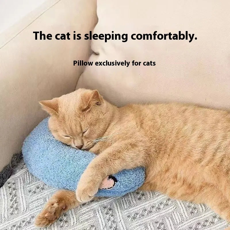 Blue and yellow cat sleeping mats with U-shaped neck pillows in moon and question mark shapes on a white background.