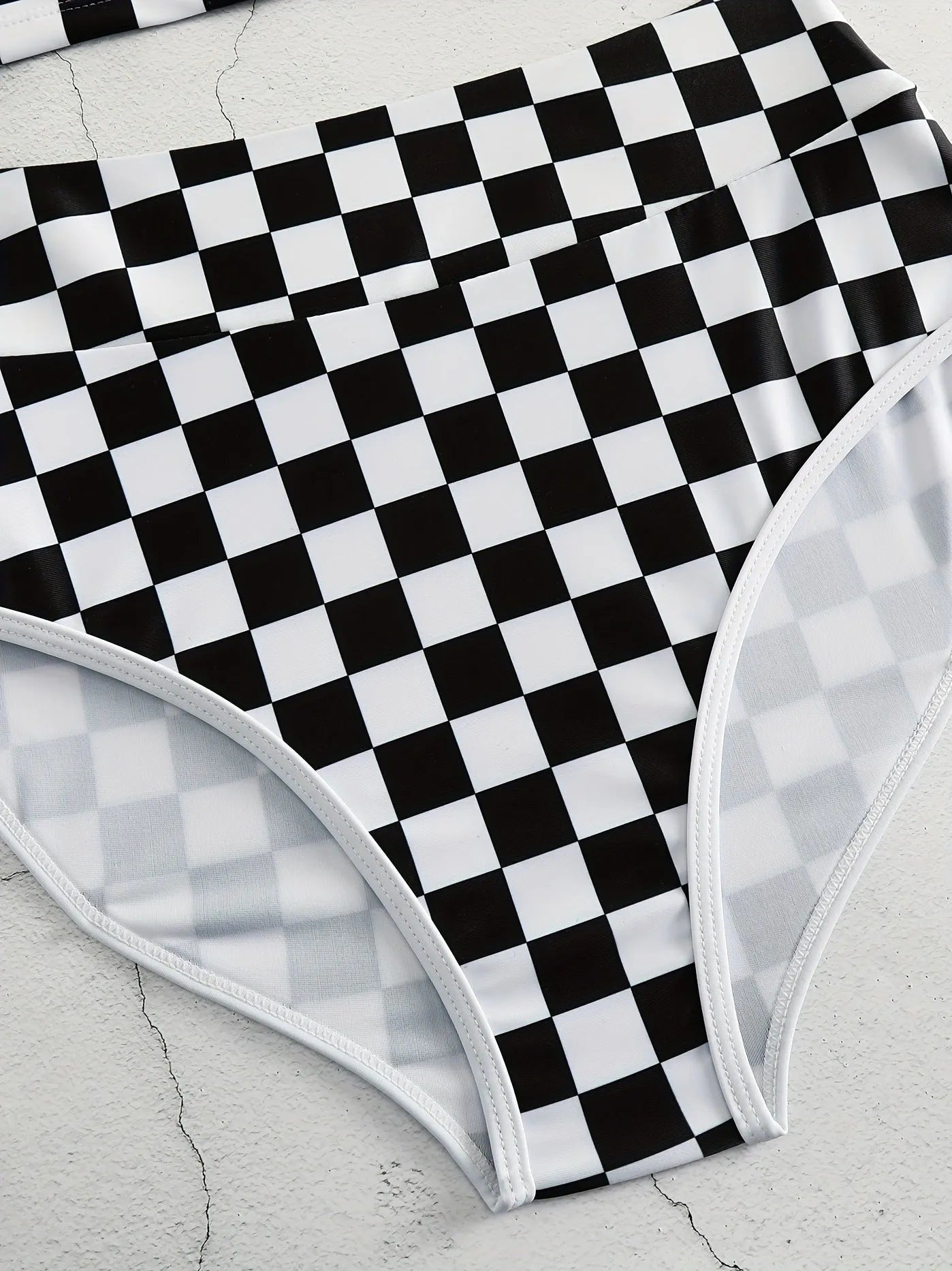 Checkered racing one-piece swimsuit with backless design and suspender straps