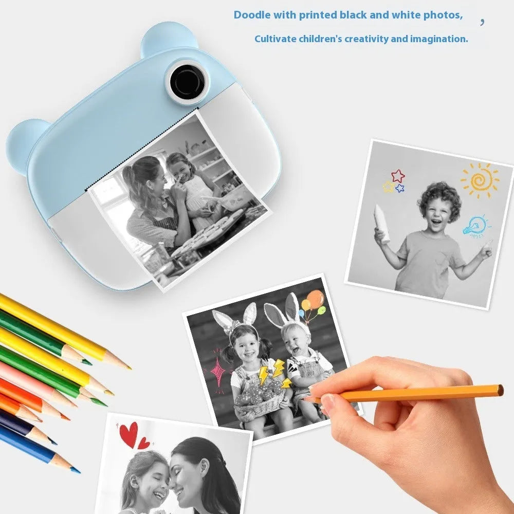 Pink children's SLR-style toy camera with a double lens on a white background.