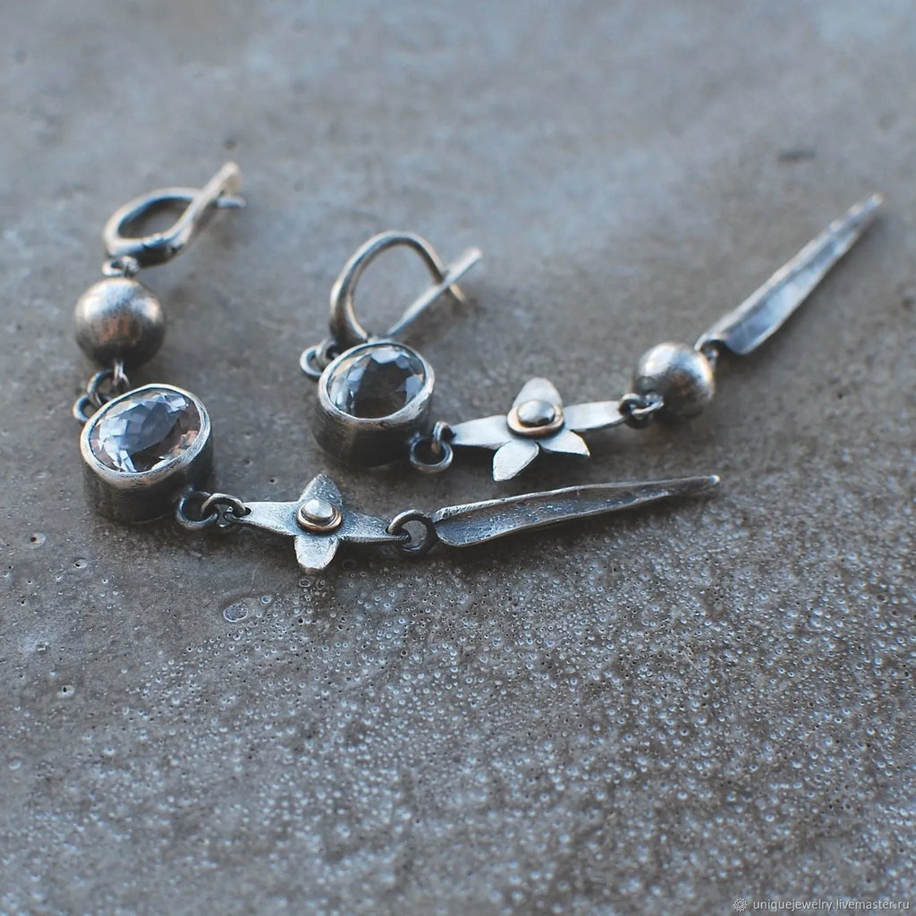 Geometric XINGX pendant earrings in antique silver finish with long drop design