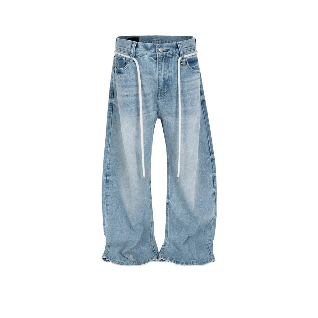Blue vintage washed straight-leg denim trousers with a drawstring belt and zipper fly.