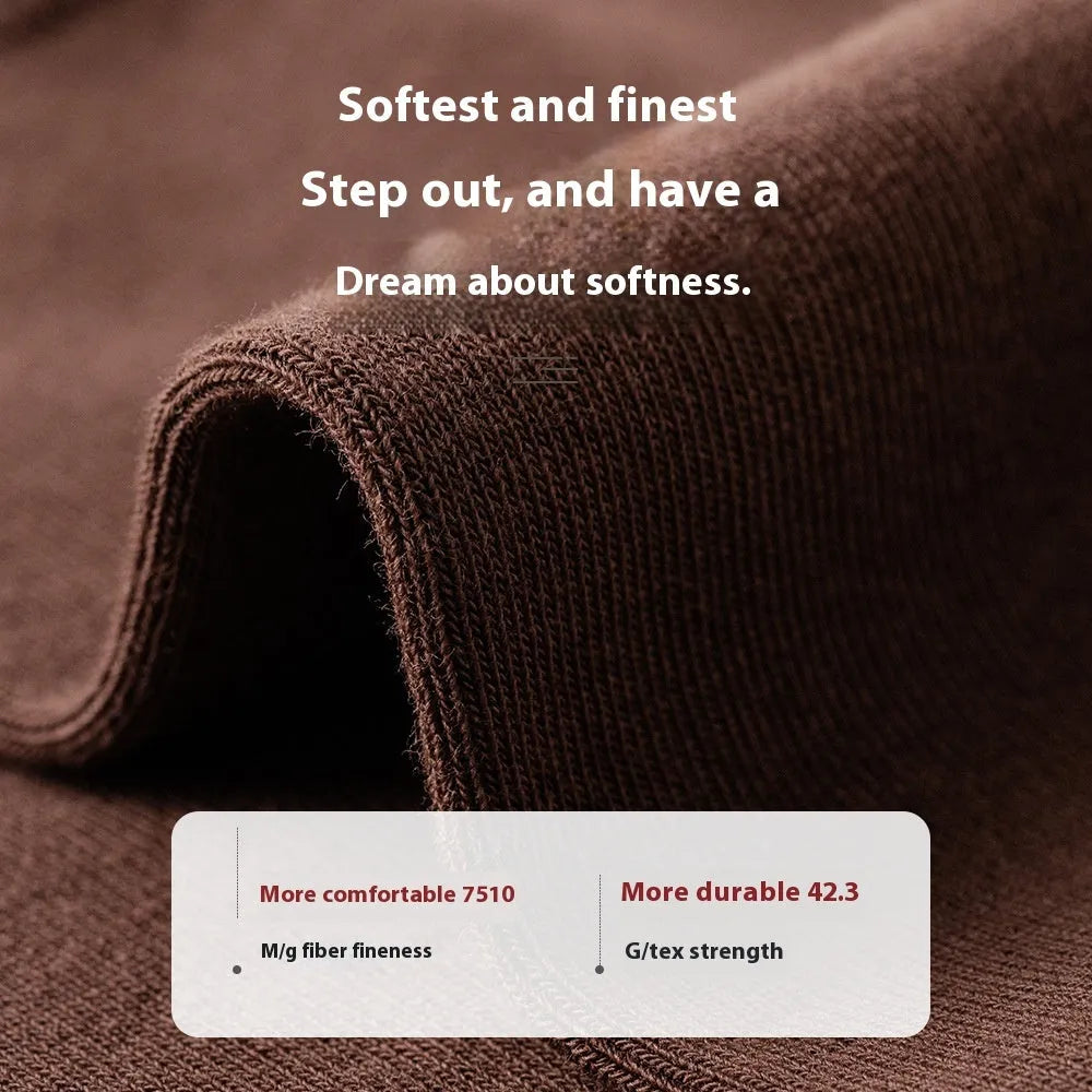 Men's mid-calf length solid colour business socks in combed cotton on a white background.