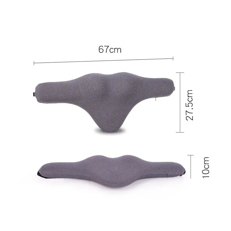 Dark grey car neck memory pillow on a headrest showing its simple rectangular shape.