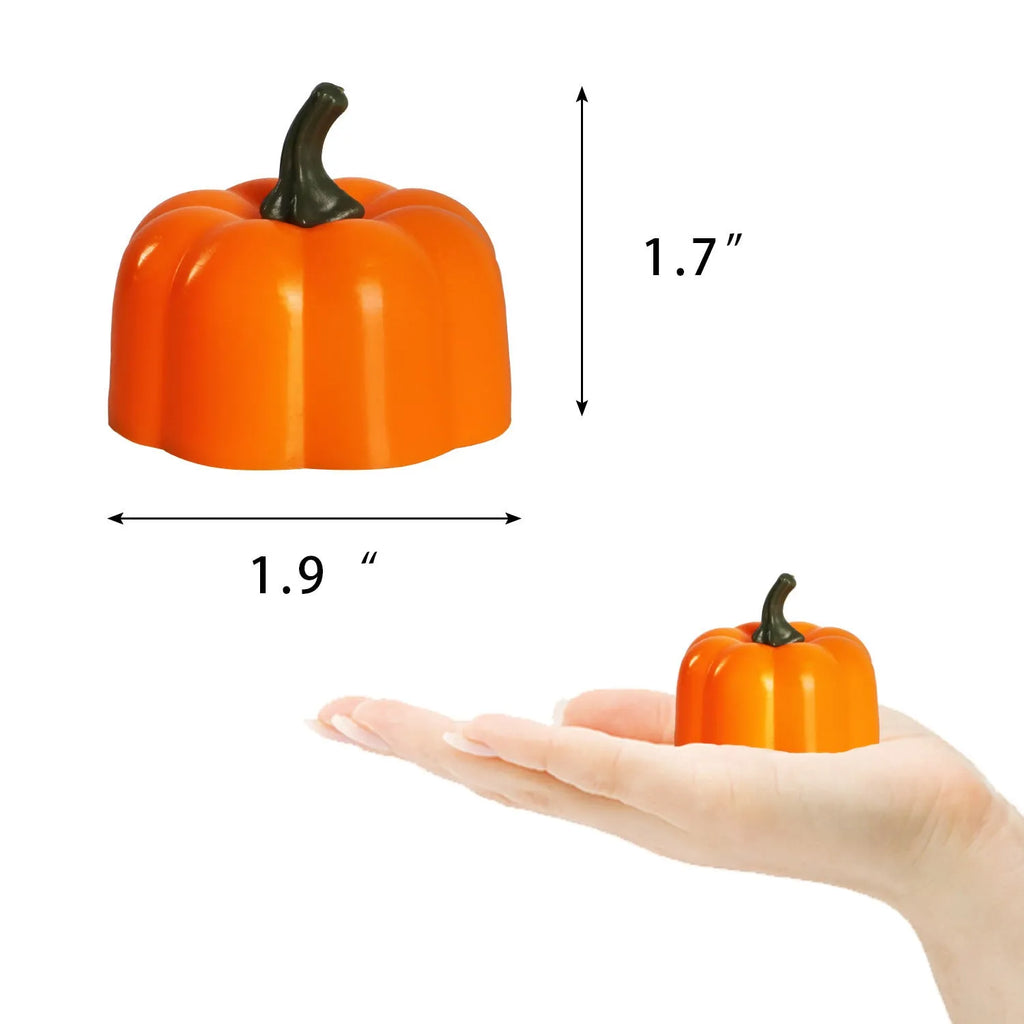Yellow LED pumpkin light decoration 4.9x4.3 cm on a tabletop for Halloween Christmas party