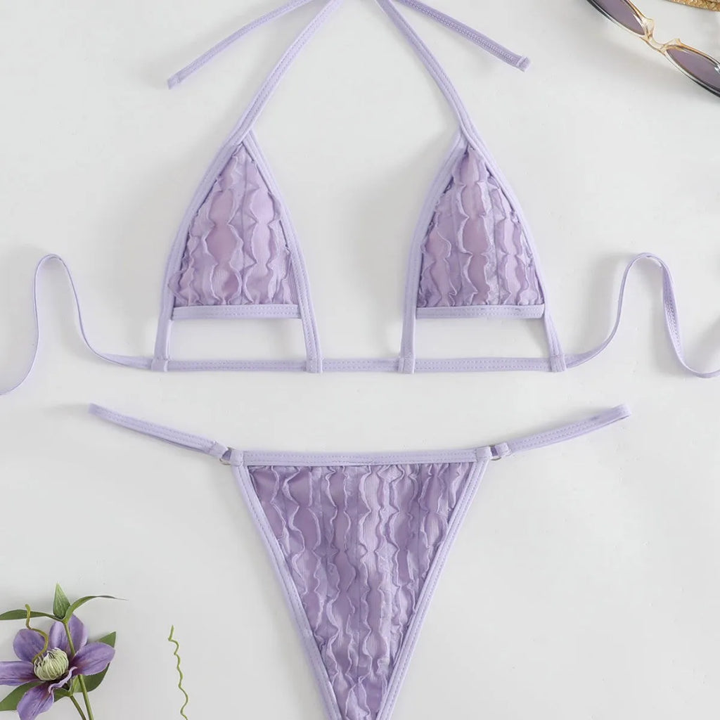Purple solid colour split swimsuit set with three-dimensional petal accents and lace-up front