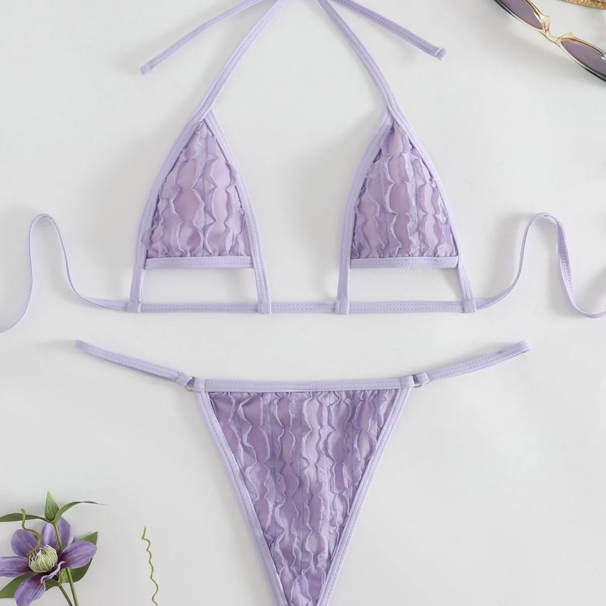 Purple solid colour split swimsuit set with three-dimensional petal accents and lace-up front