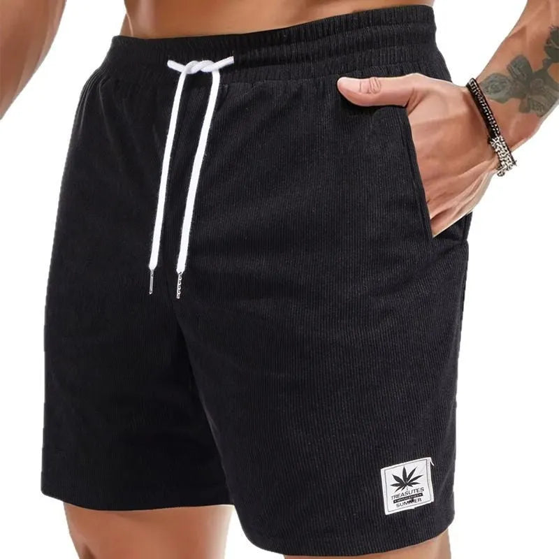 Men's black drawstring summer shorts with straight legs and micro-elastic polyester fabric