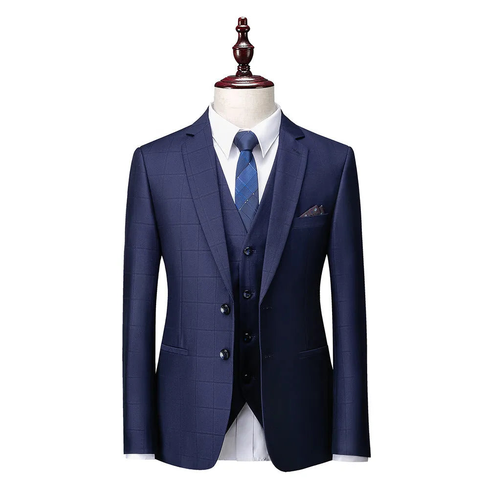 Men's navy blue slim fit three-piece plaid suit with vest, jacket and trousers on hanger