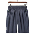 Men's polyester beach casual shorts in solid colour with zippered pocket, Asian sizes M to 8XL, colour Black