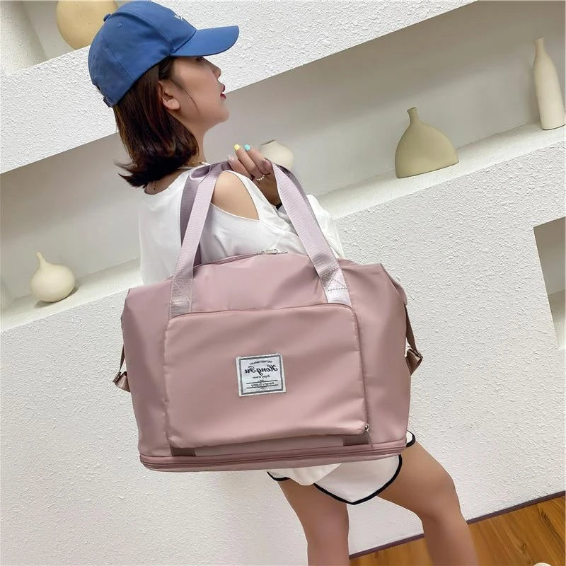 Versatile foldable travel bag for women with waterproof and spacious design, featuring various interior pockets and carrying options.