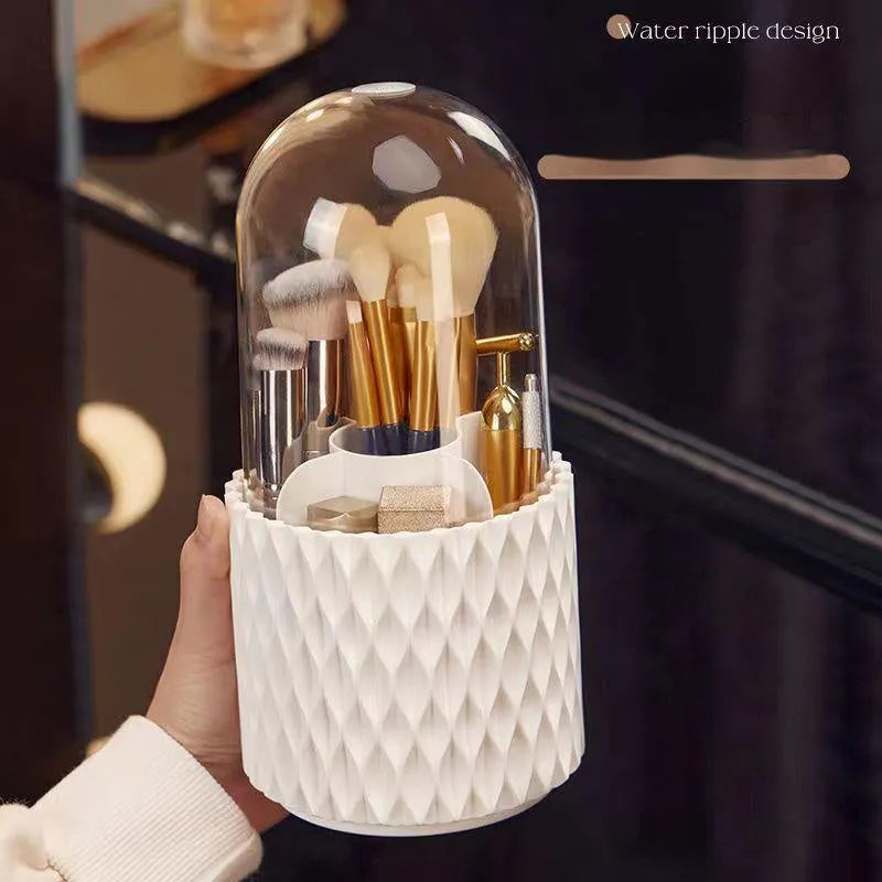 White rotating acrylic makeup brush storage box with transparent dust cover on desktop