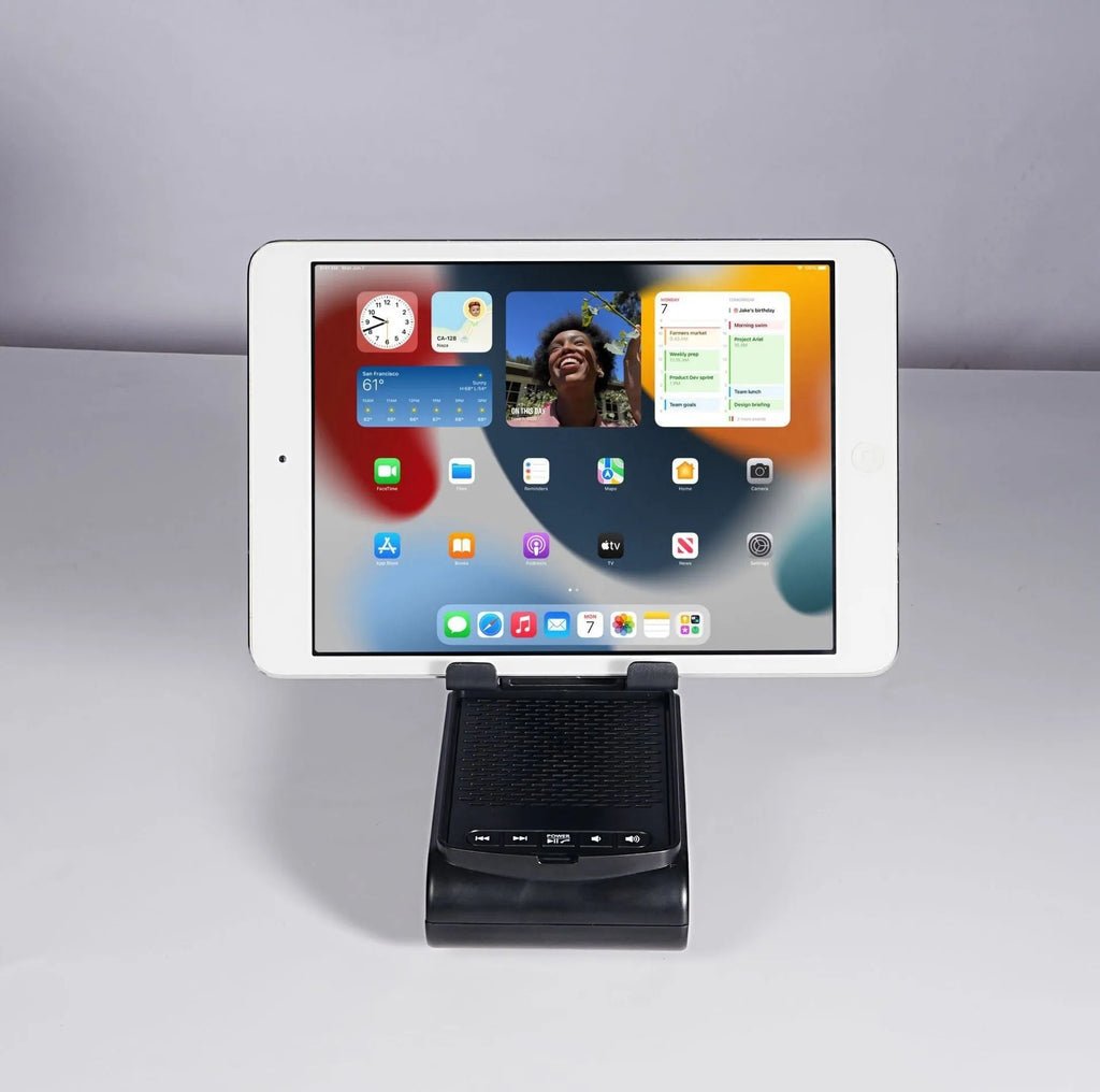 Multi-function lazy phone holder with Bluetooth audio speaker in black plastic, USB powered