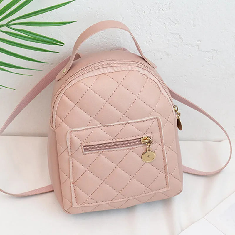 Hard Korean-style backpack with embroidery detail measuring 16x7x19cm in pink colour