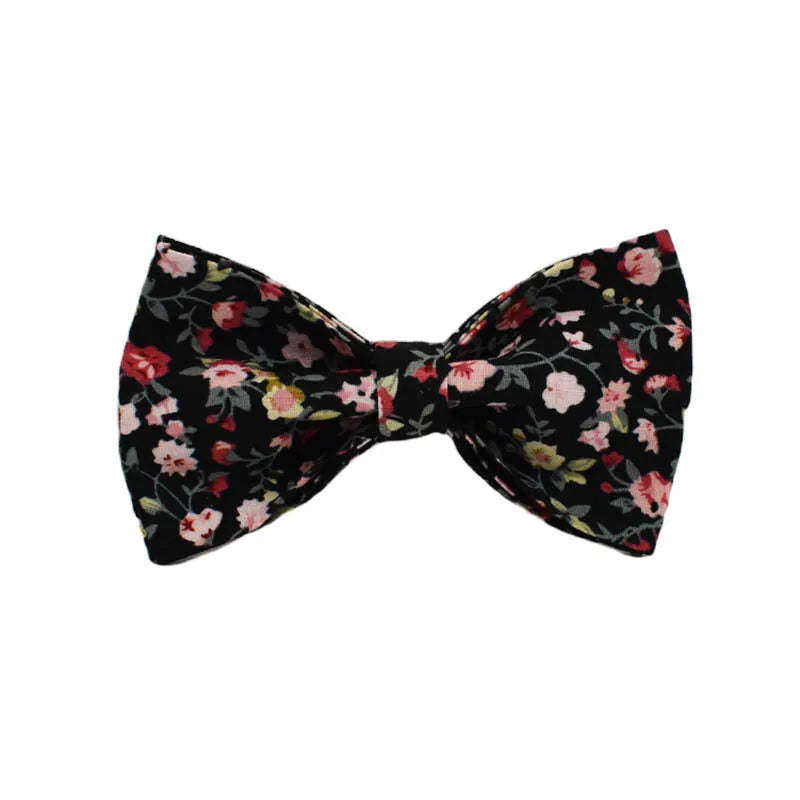 Four-piece dog accessory set showing removable bow collar, leash, vest and decorative bows in coordinated colours