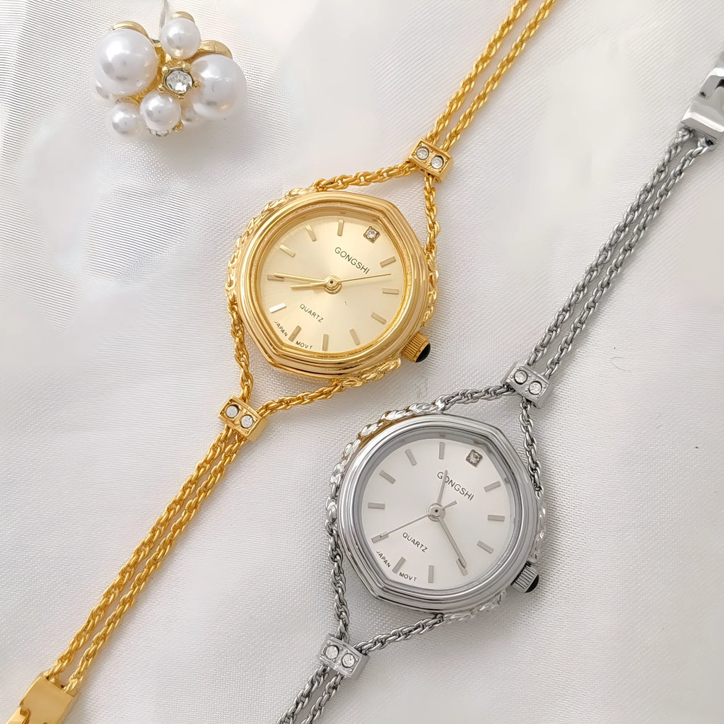 Women's quartz watch with 25mm dial and chain strap in gold or silver finish