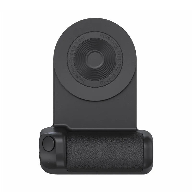 Black magnetic phone camera holder with rotatable grip on wooden table demonstrating phone attachment