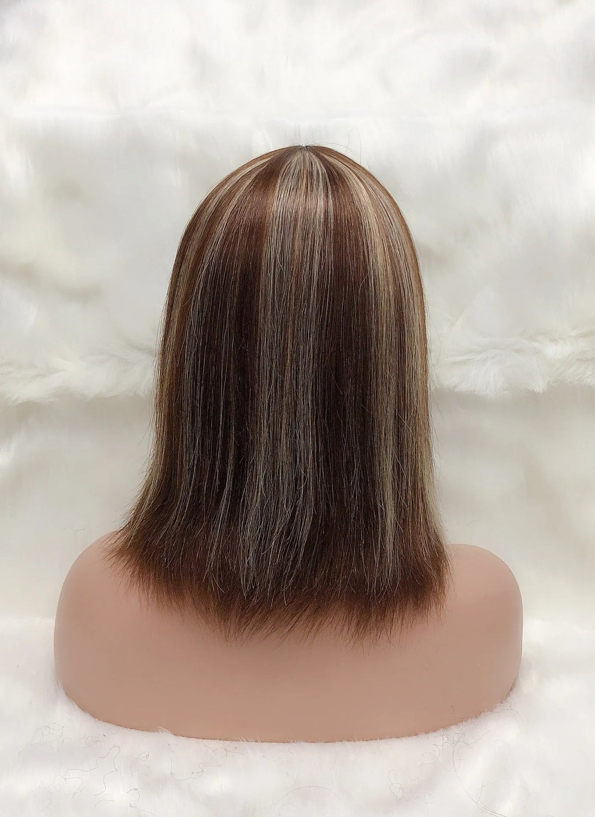 Full Mechanic 4 27 Bob human hair wig in brown with straight bangs, medium length on a mannequin head