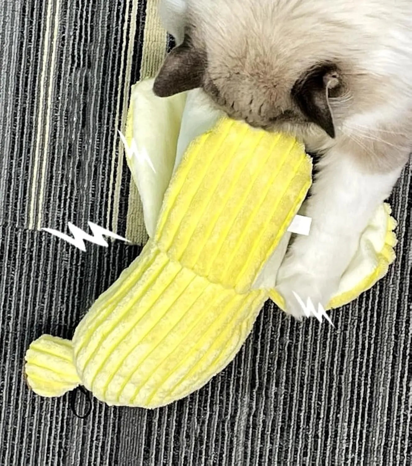 Yellow banana-shaped cat toy with plush fabric and crinkle paper sounds for indoor feline exercise
