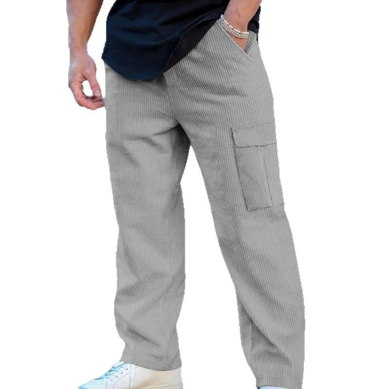 Men's corduroy cargo trousers in navy blue with straight-leg wide-cut design and drawstring waist