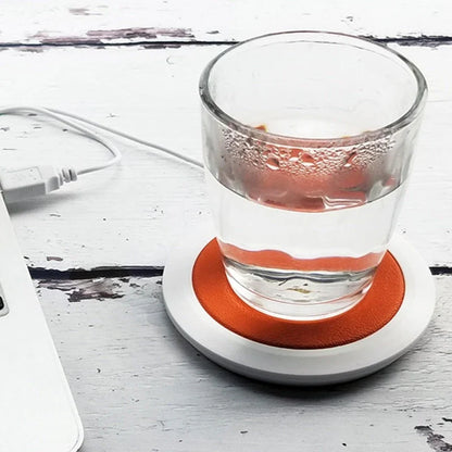 Stylish USB-powered mug warmer with a sleek, modern design that keeps your coffee, tea, or hot chocolate at the perfect temperature all day.