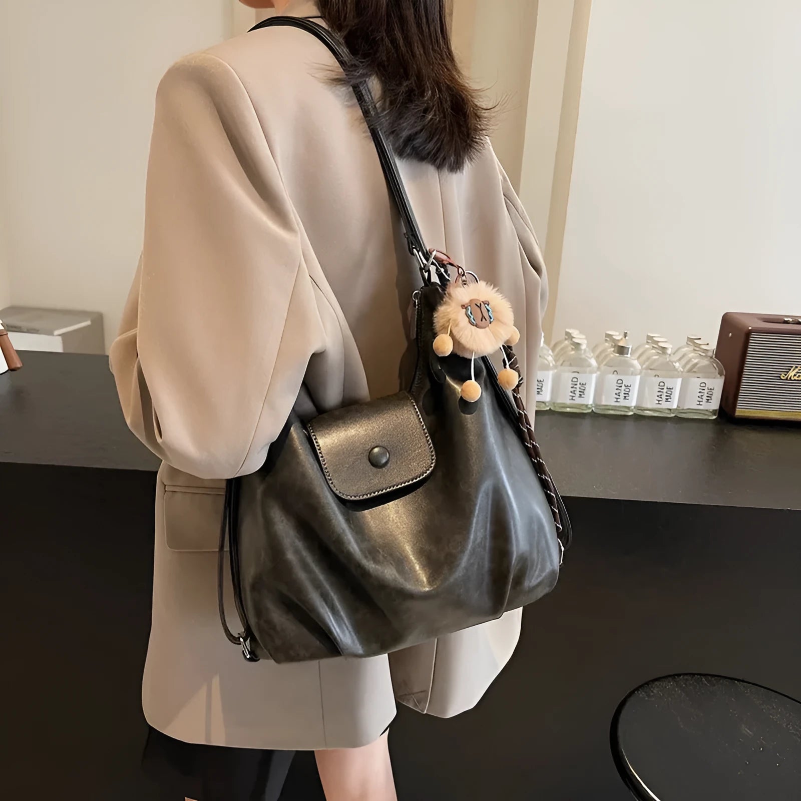 Women's textured PU leather commuter shoulder bag with horizontal design and single strap