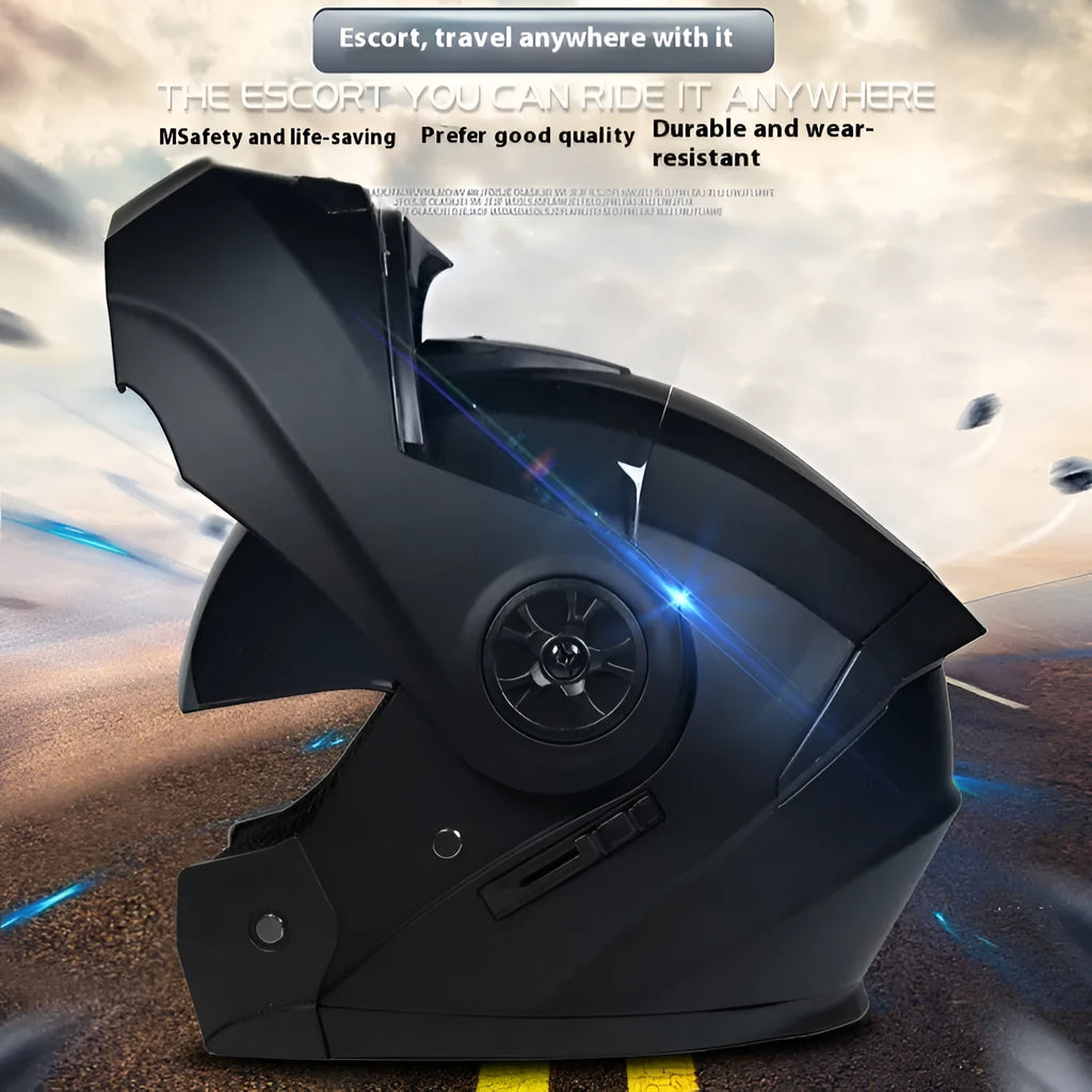 Matte black full face motorcycle helmet with integrated battery visor on a stand