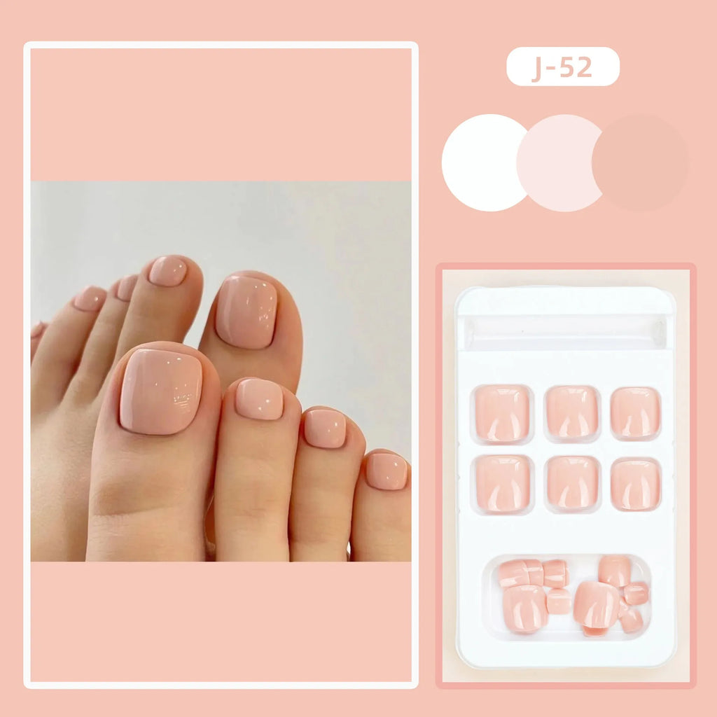 Plastic toenail stickers in skin colour with adhesive glue bottle on white background