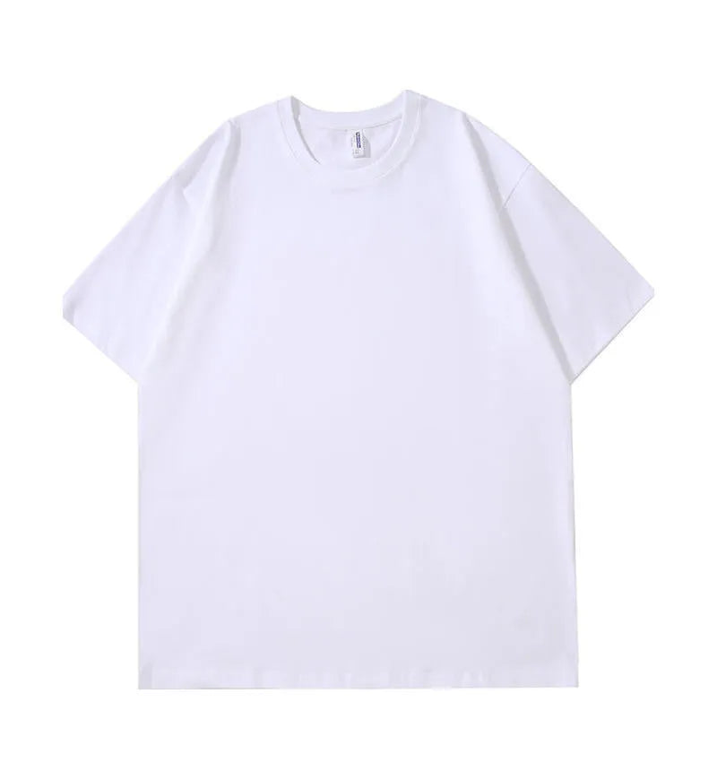 Man wearing a heavy cotton loose-fit T-shirt in navy blue, showing short sleeves and casual style.
