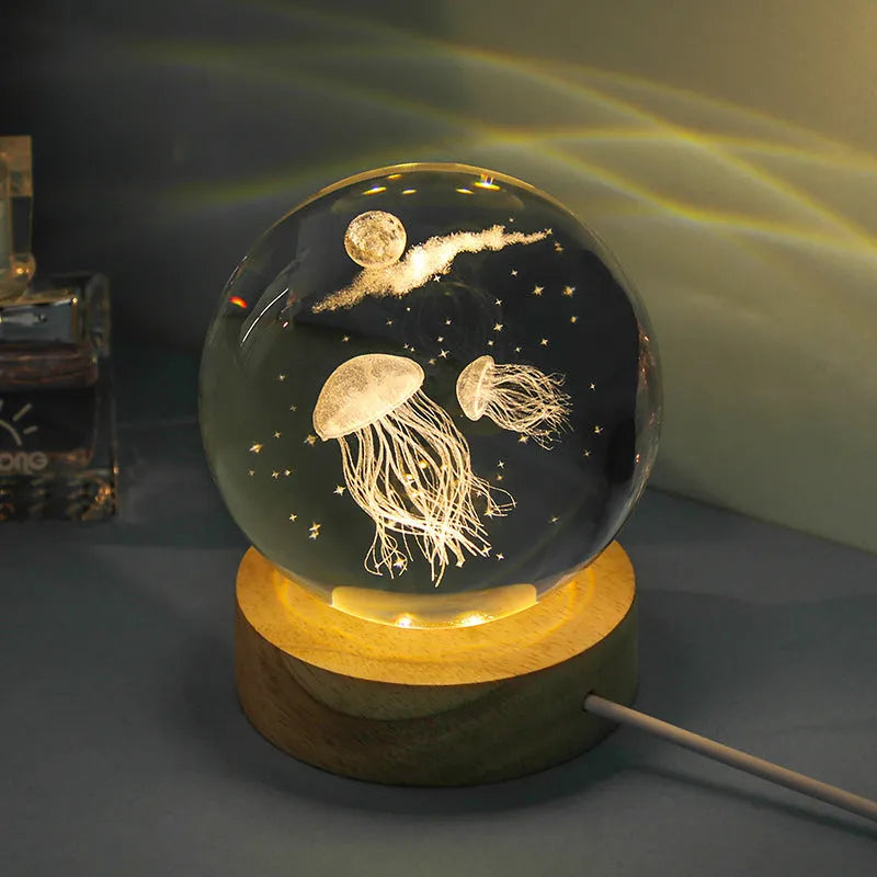 Transparent crystal ball night lamp with carved jellyfish design and USB cable