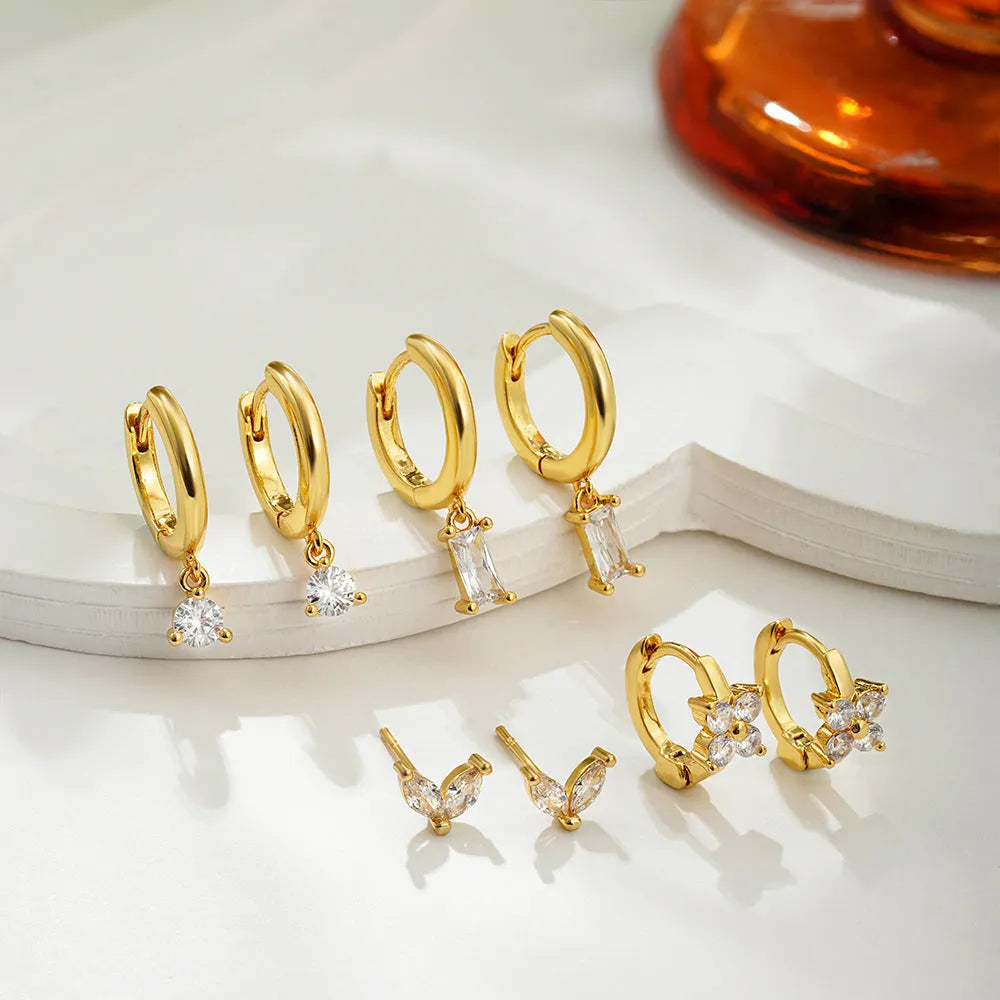 Geometric square zircon four-piece earrings for women with gold electroplated finish on copper